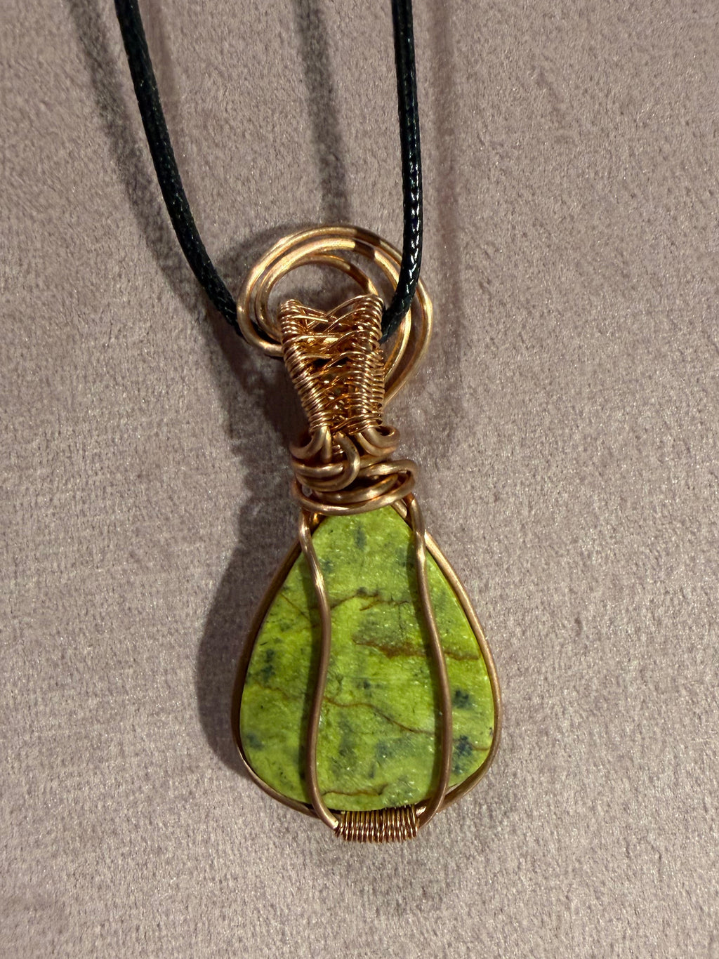 Atlantisite copper wire-wrapped pendant