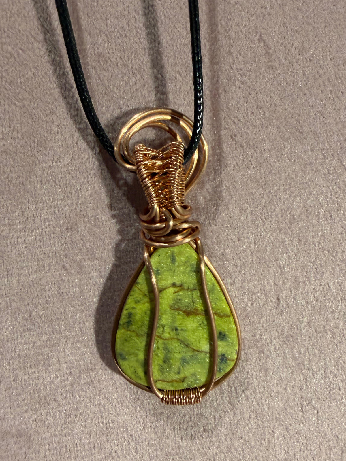 Atlantisite copper wire-wrapped pendant