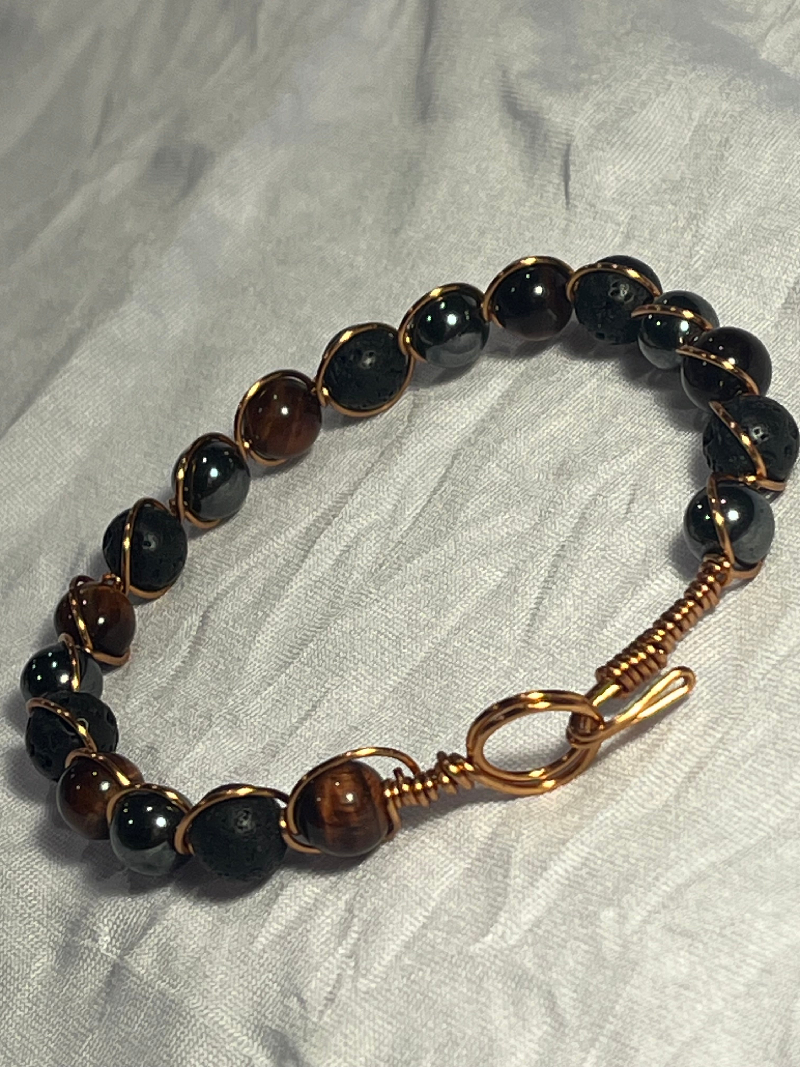 Hematite, Red Tiger's Eye & Lava Stone 7.5 inch copper wire-wrapped bracelet