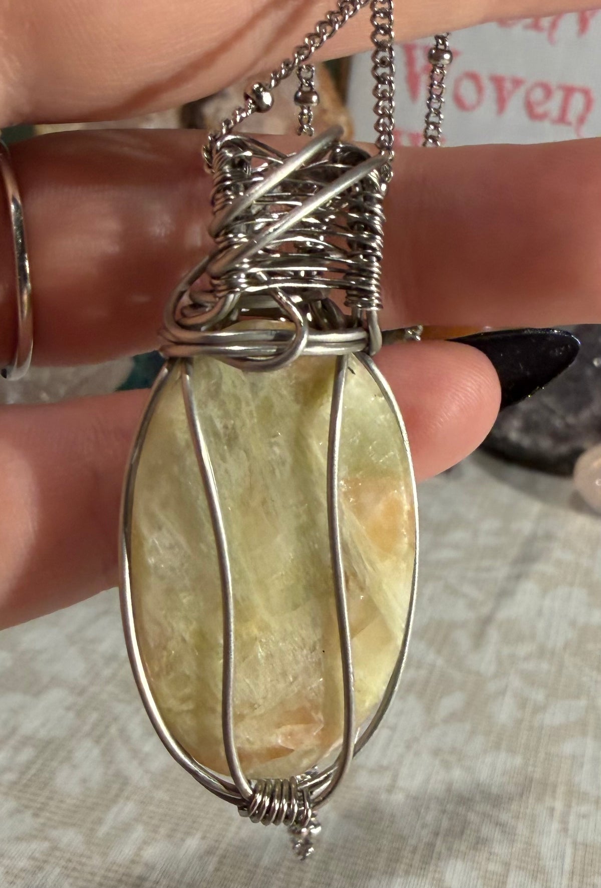 Green Aphophylite & Peach Stilbite stainless steel wire-wrapped pendant