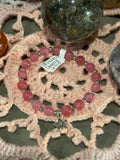 Strawberry Quartz 6.5-inch stretchy bracelet with flower charm