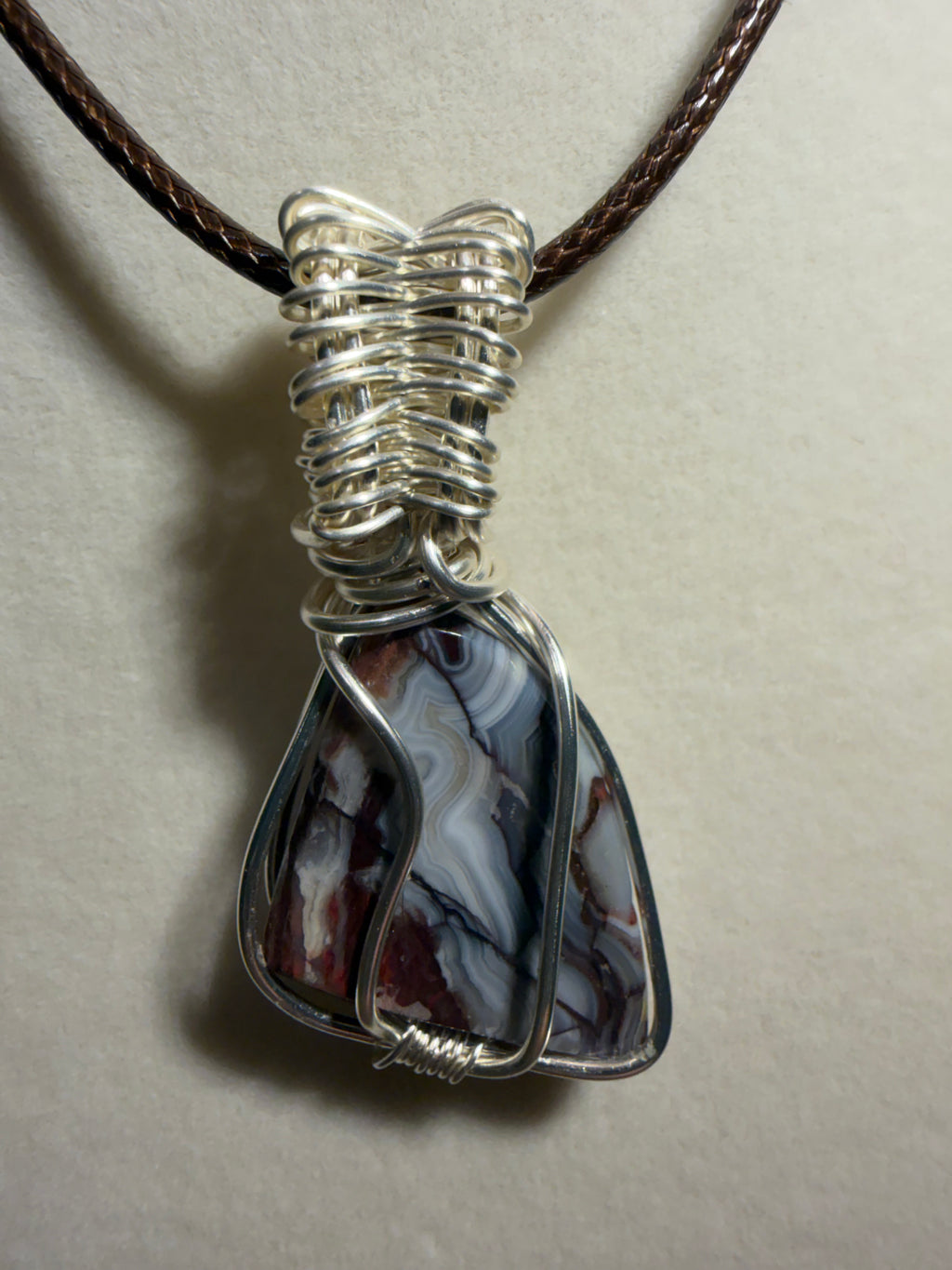 Mexican Crazy Lace Agate silver-tone copper wire-wrapped pendant