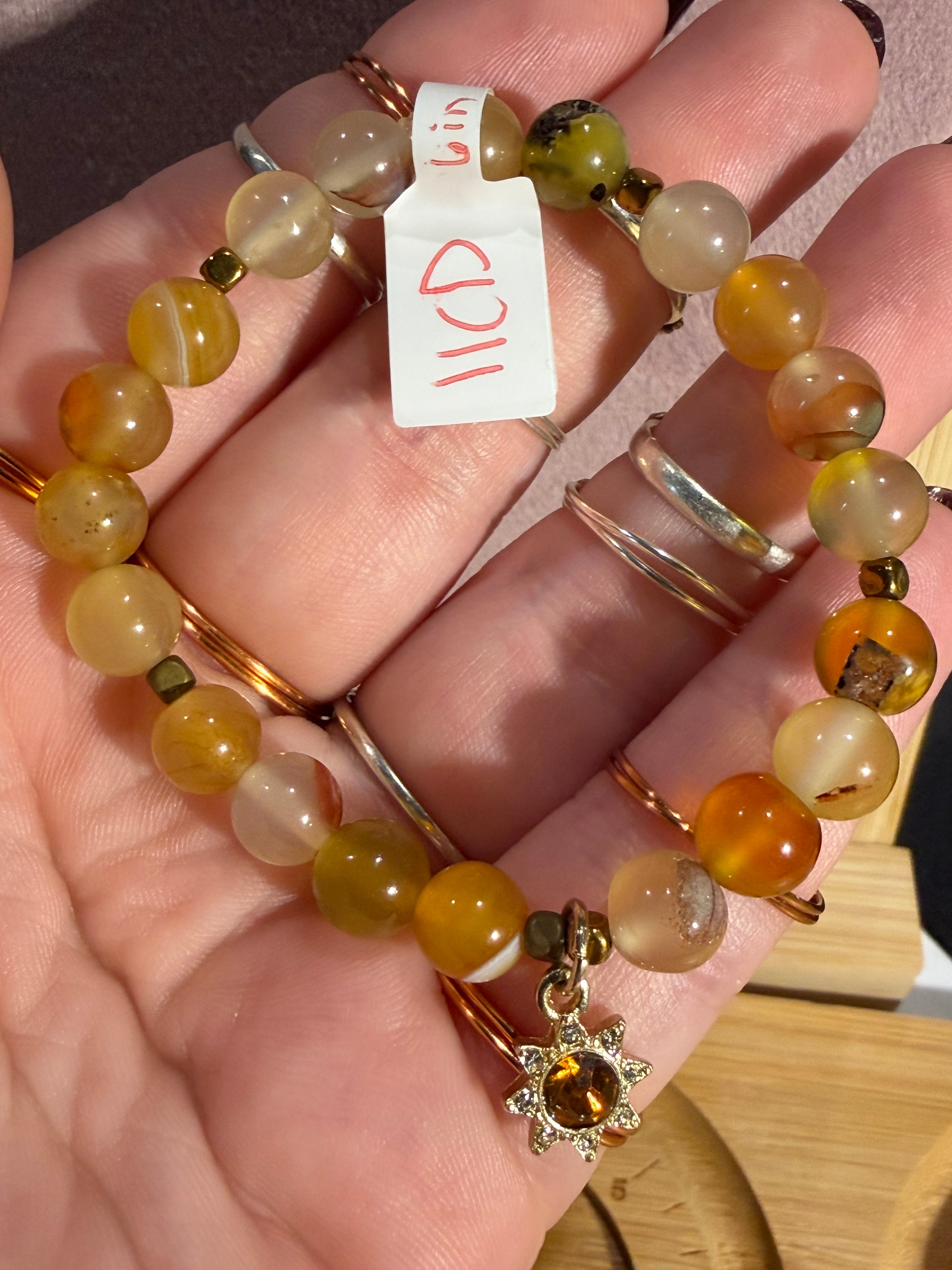 Amber 6-inch stretchy bracelet with sun charm