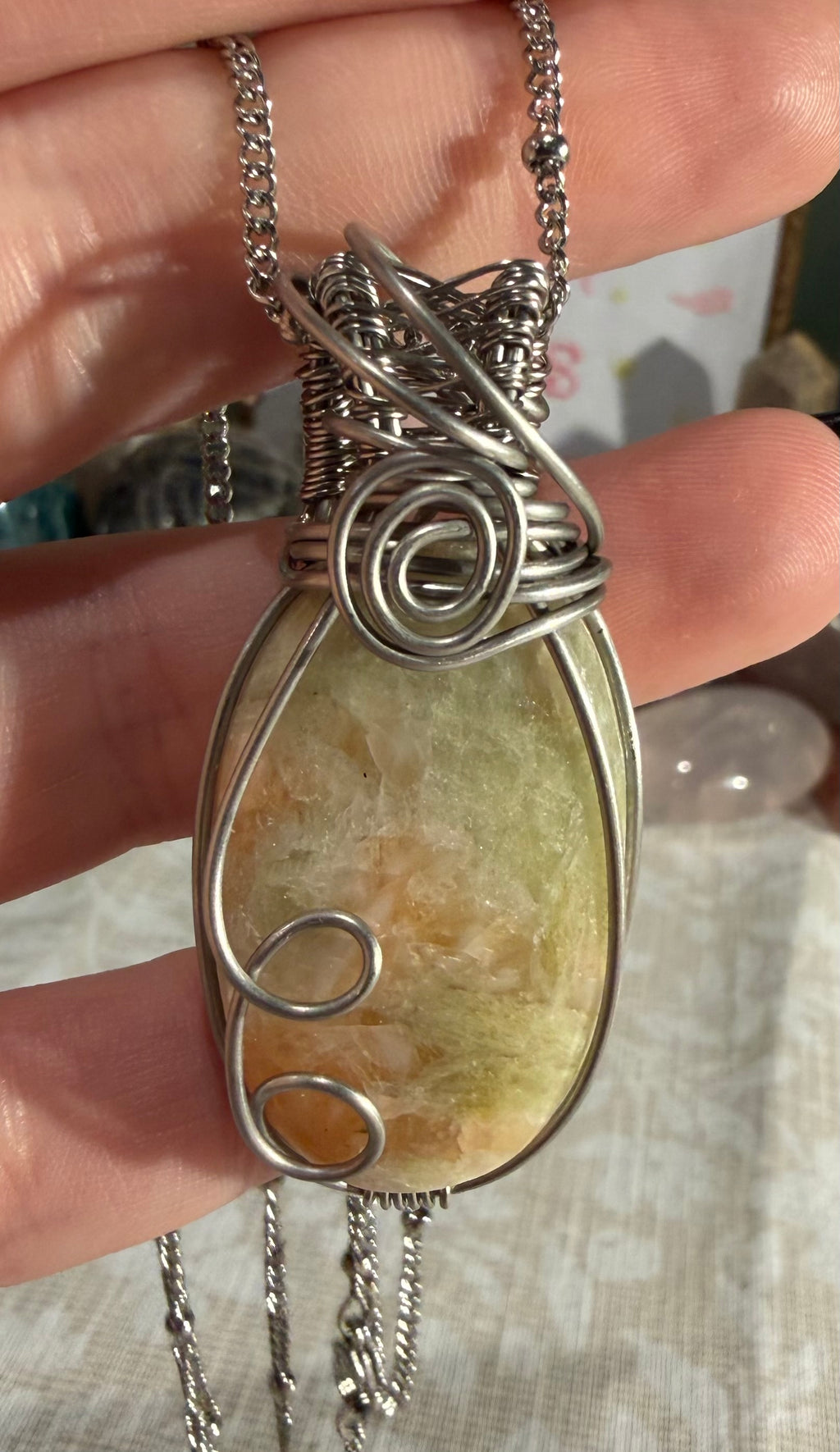 Green Aphophylite & Peach Stilbite stainless steel wire-wrapped pendant