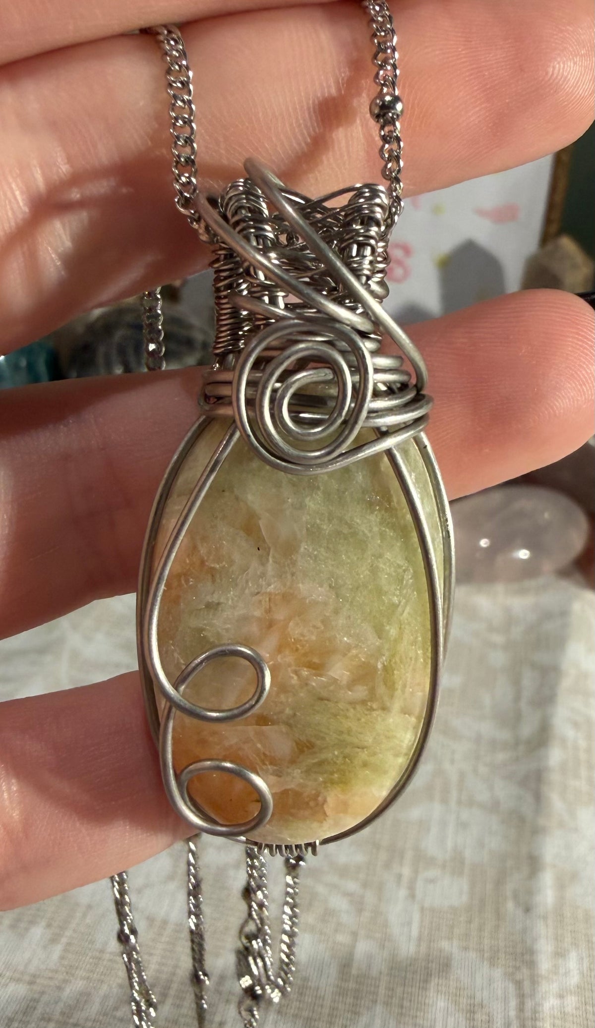 Green Aphophylite & Peach Stilbite stainless steel wire-wrapped pendant