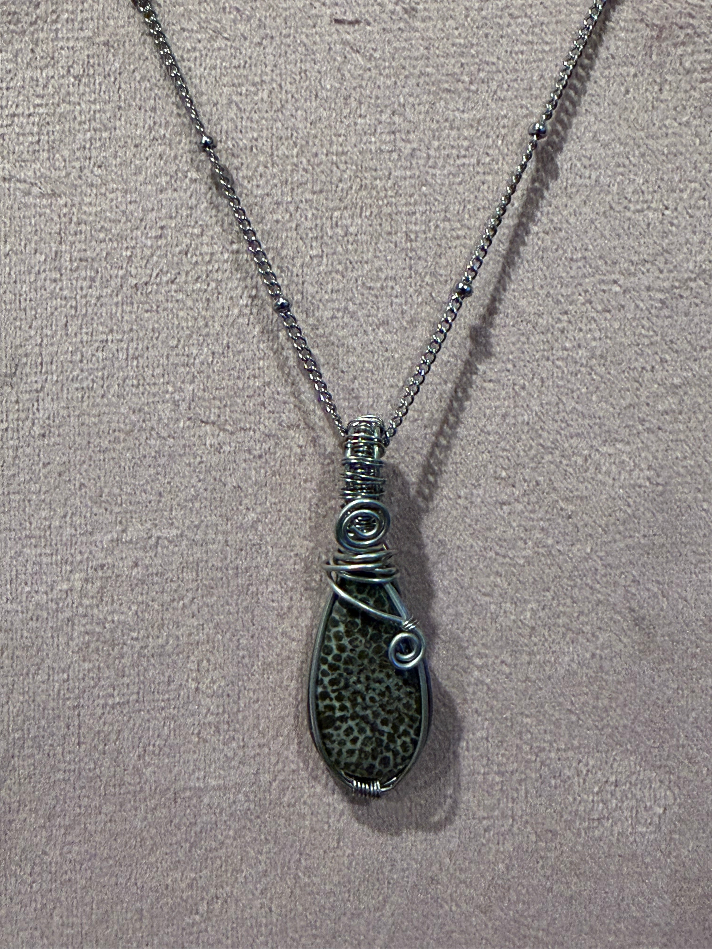 Black Fossilized Coral stainless-steel wire-wrapped pendant