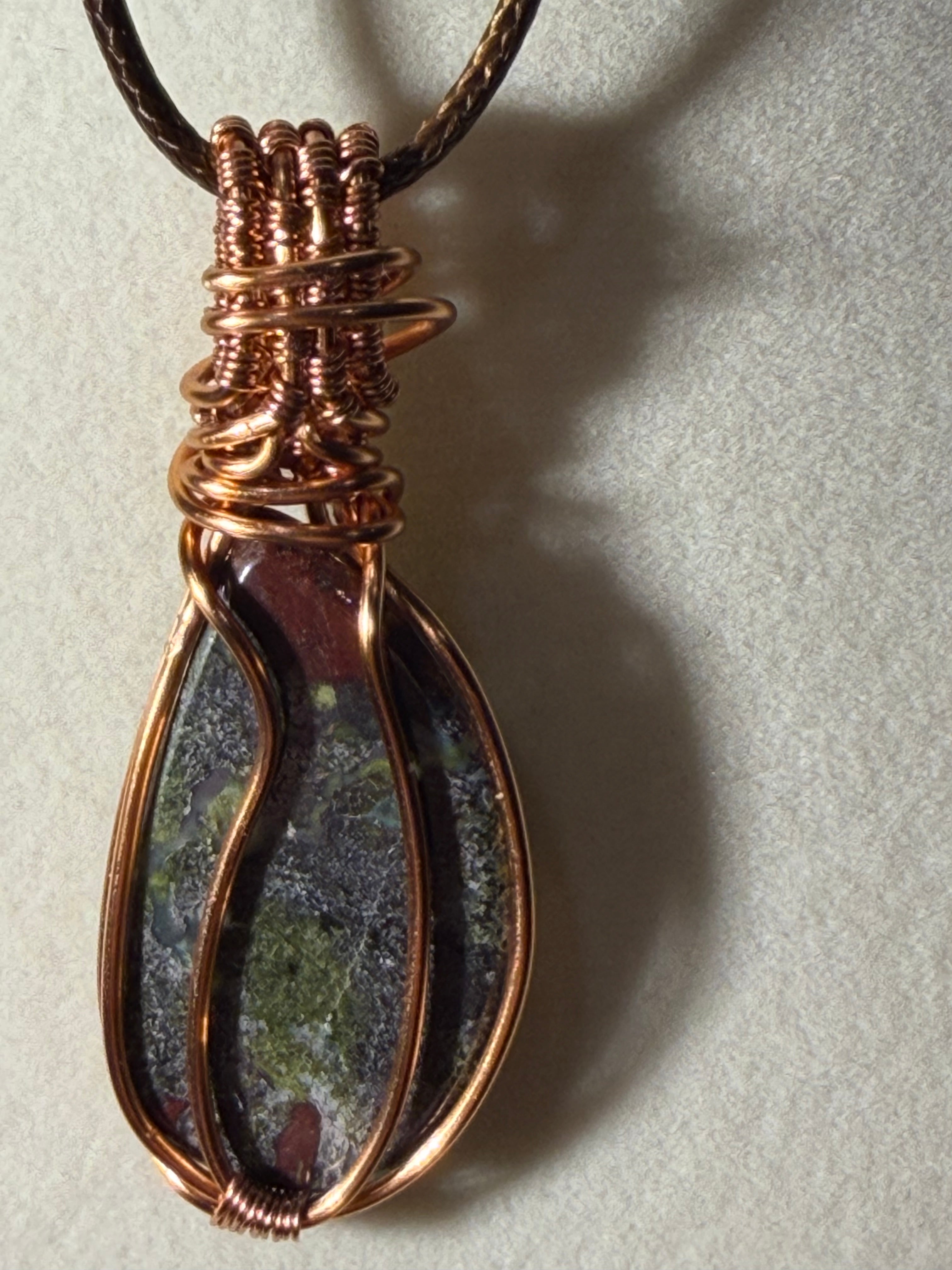 Dragon Stone & Garnet copper wire-wrapped pendant