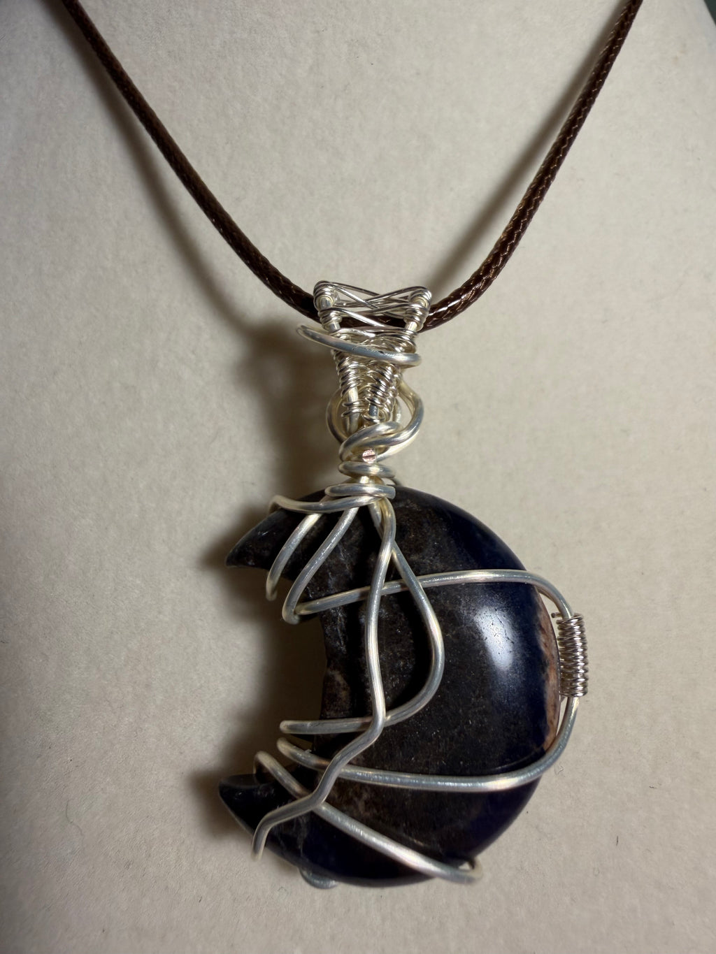 Sodalite moon silver-tone copper wire-wrapped pendant