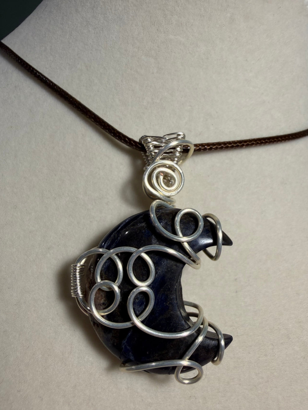 Sodalite moon silver-tone copper wire-wrapped pendant