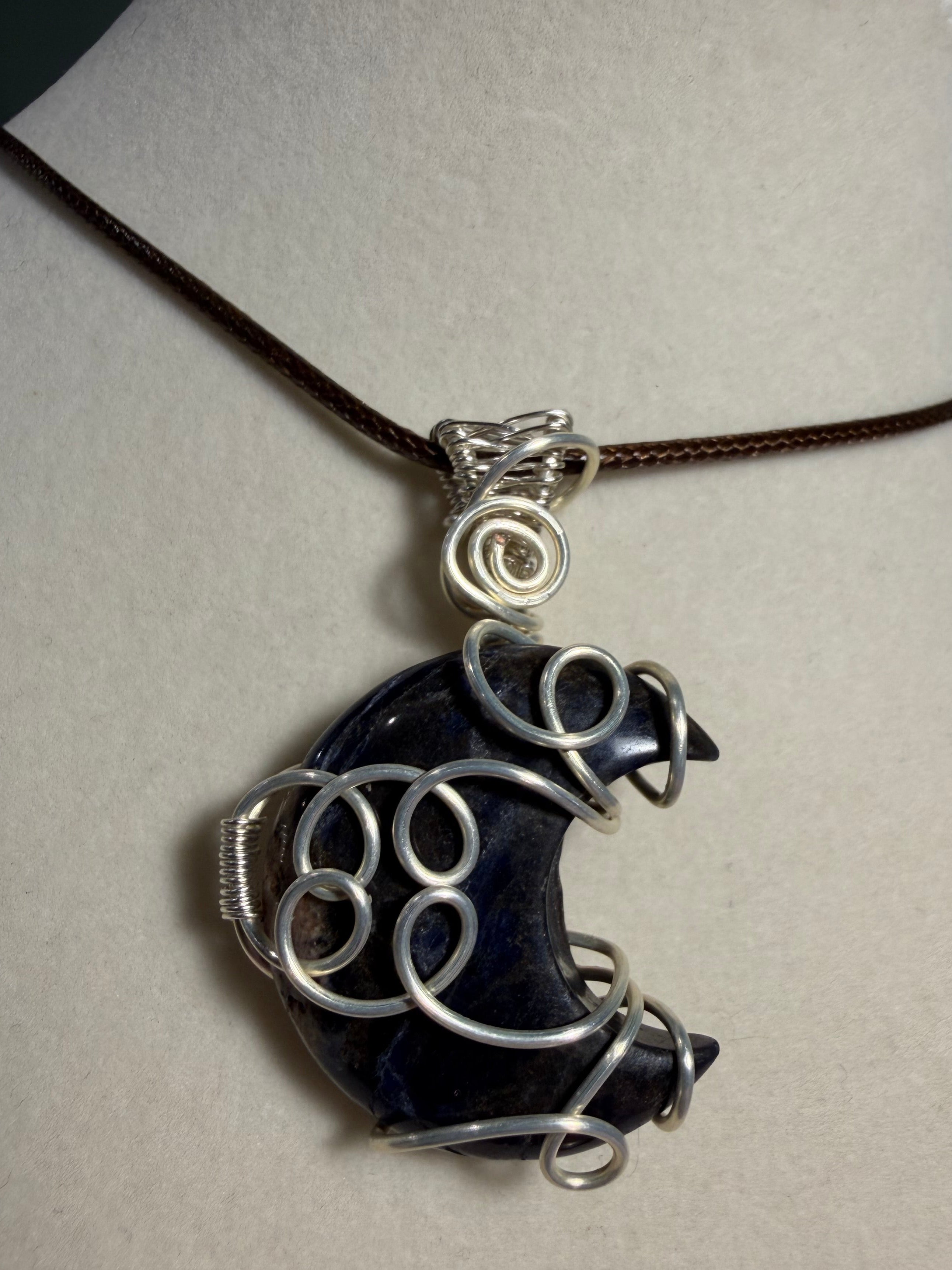 Sodalite moon silver-tone copper wire-wrapped pendant