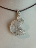 Clear Quartz moon silver-tone copper wire-wrapped pendant