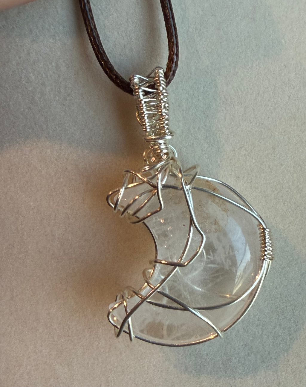 Clear Quartz moon silver-tone copper wire-wrapped pendant