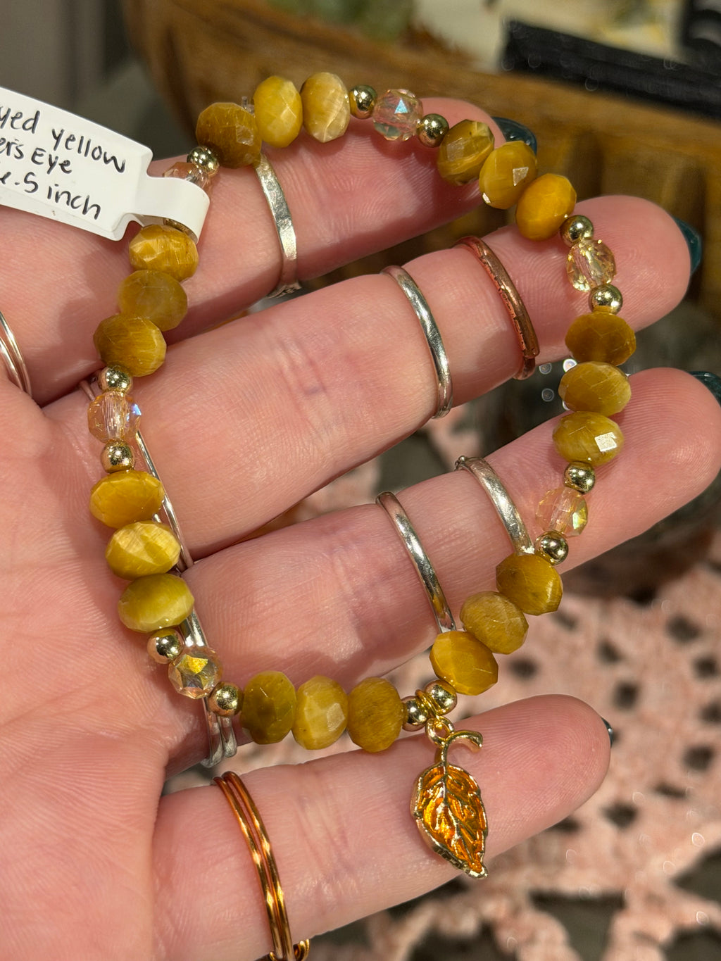 faceted dyed yellow Tiger's Eye 6.5-inch stretchy bracelet with leaf charm