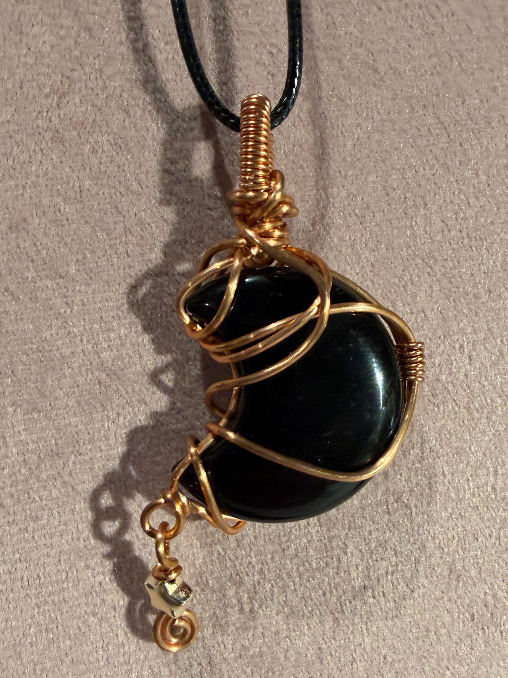 Obsidian copper wire-wrapped moon pendant