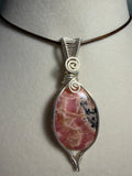 Rhodochrosite silver-tone copper wire-wrapped pendant