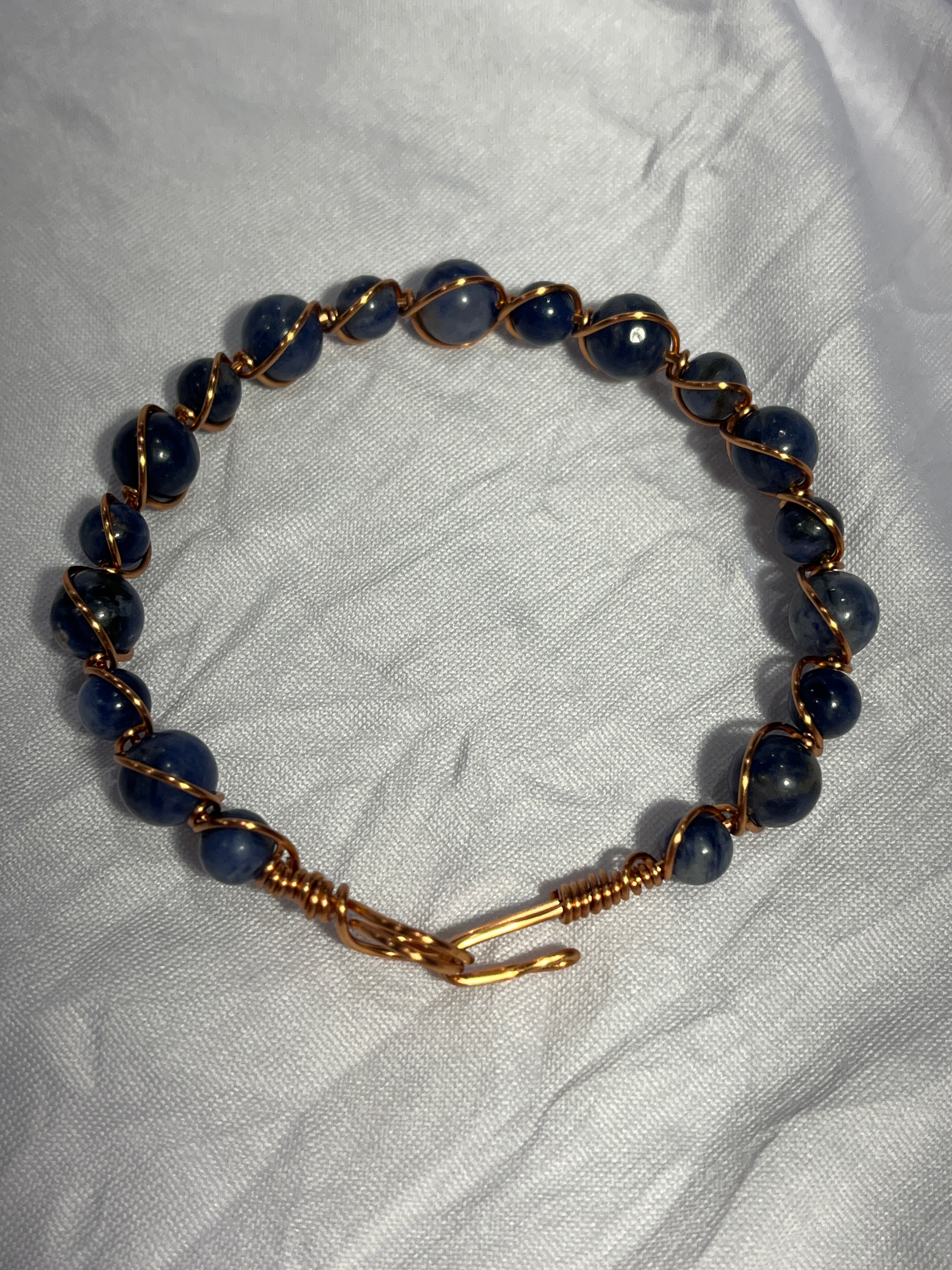 Sodalite 7.5 inch copper wire-wrapped bracelet