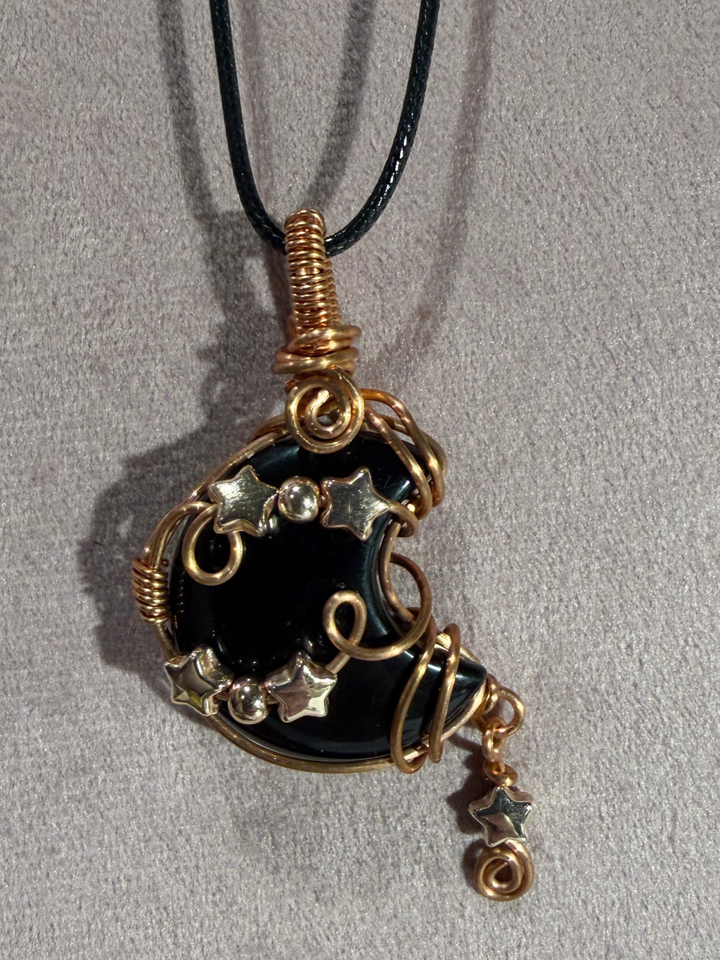 Obsidian copper wire-wrapped moon pendant