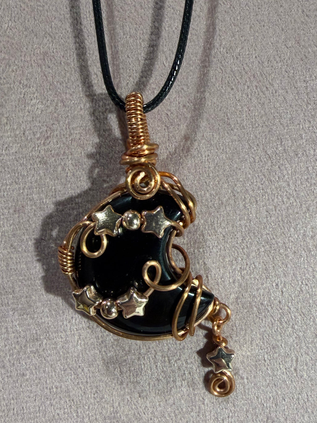 Obsidian copper wire-wrapped moon pendant