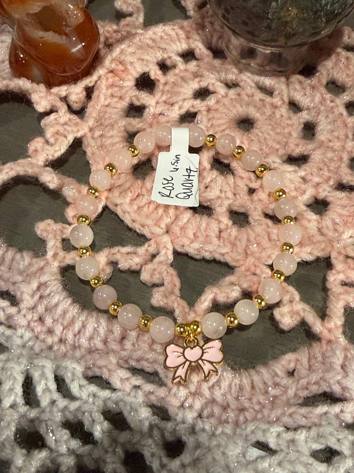 Rose Quartz 6.5-inch stretchy bracelet with bow charm
