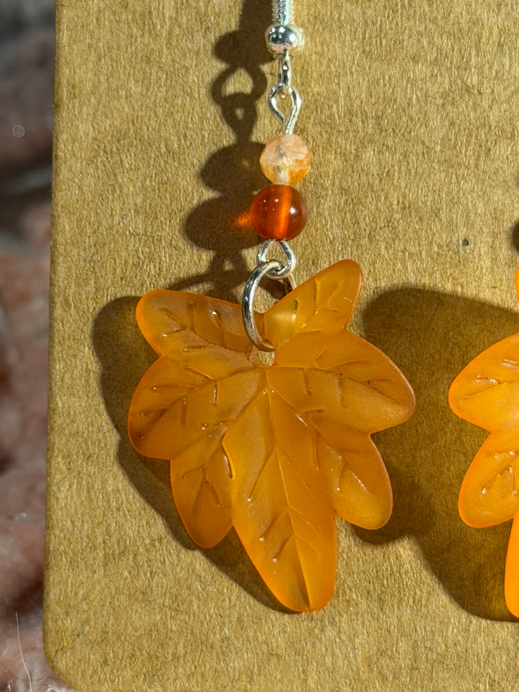 Orange leaf dangle earrings