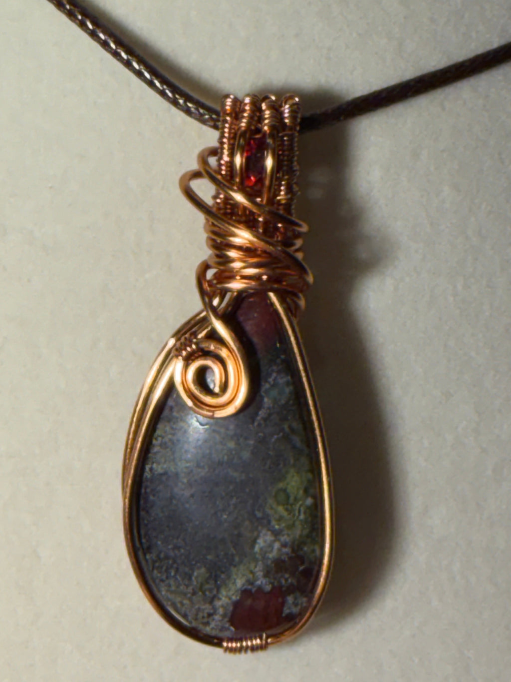 Dragon Stone & Garnet copper wire-wrapped pendant