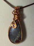 Dragon Stone & Garnet copper wire-wrapped pendant