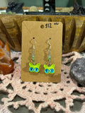 Blue Topaz & glass green cat head earrings