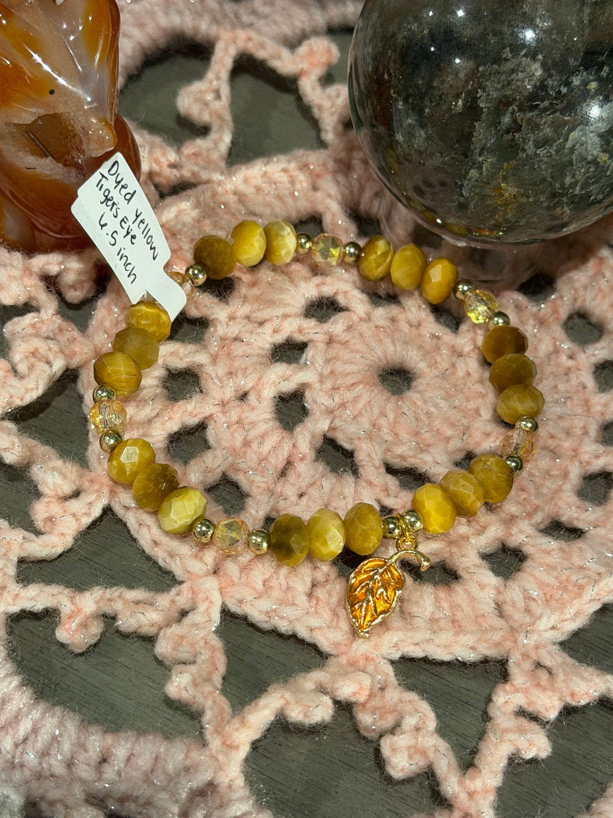 faceted dyed yellow Tiger's Eye 6.5-inch stretchy bracelet with leaf charm