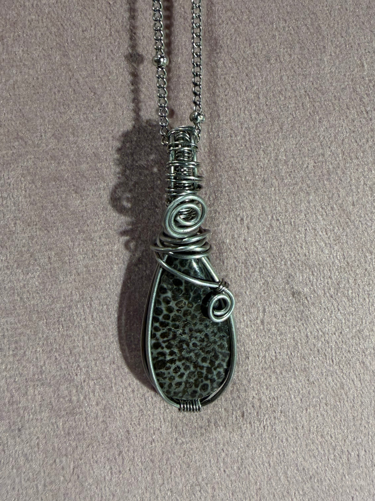 Agatized fossil coral stainless steel wire-wrapped pendant