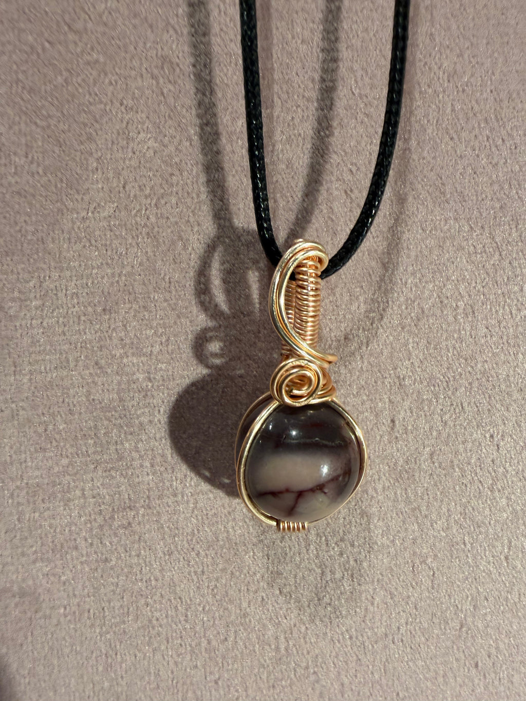 Mookaite Jasper rose-gold colored copper wire-wrapped pendant