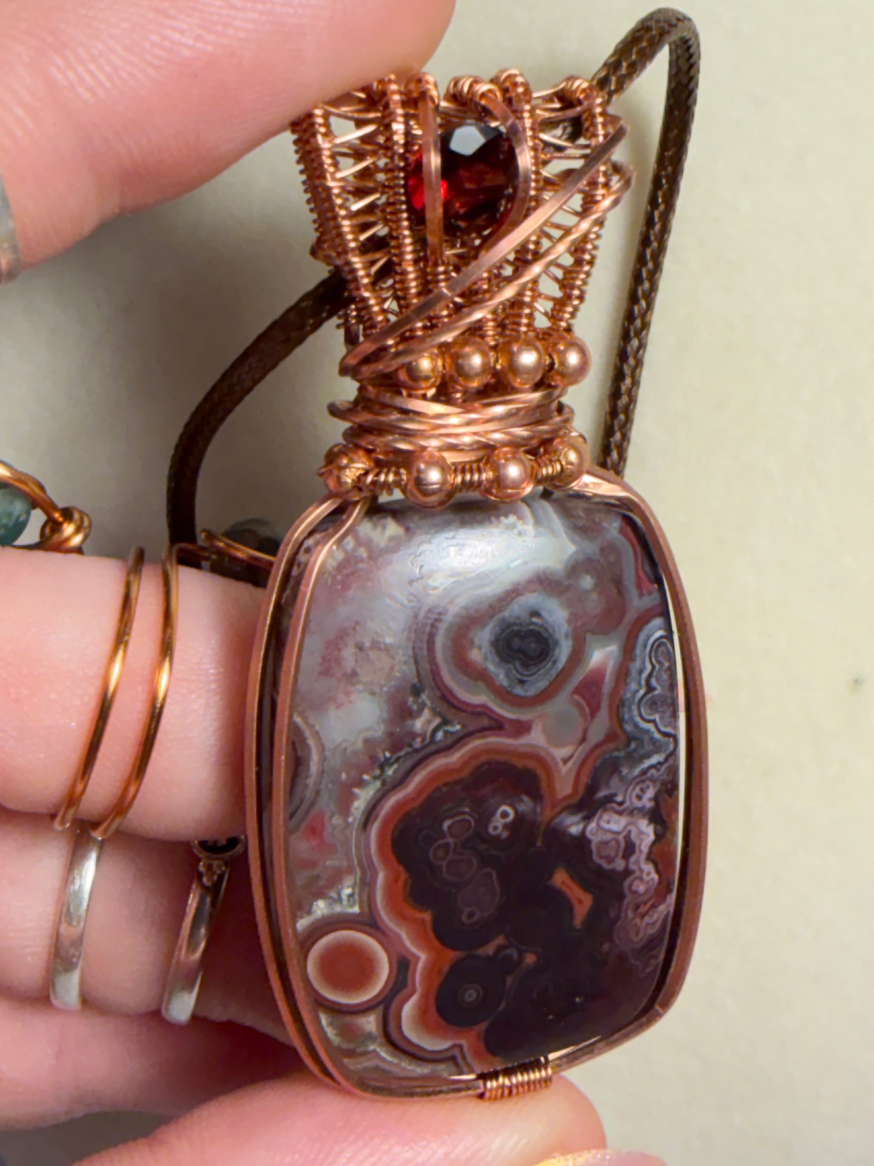 Mexican Crazy Lace Agate & Garnet copper wire-wrapped pendant