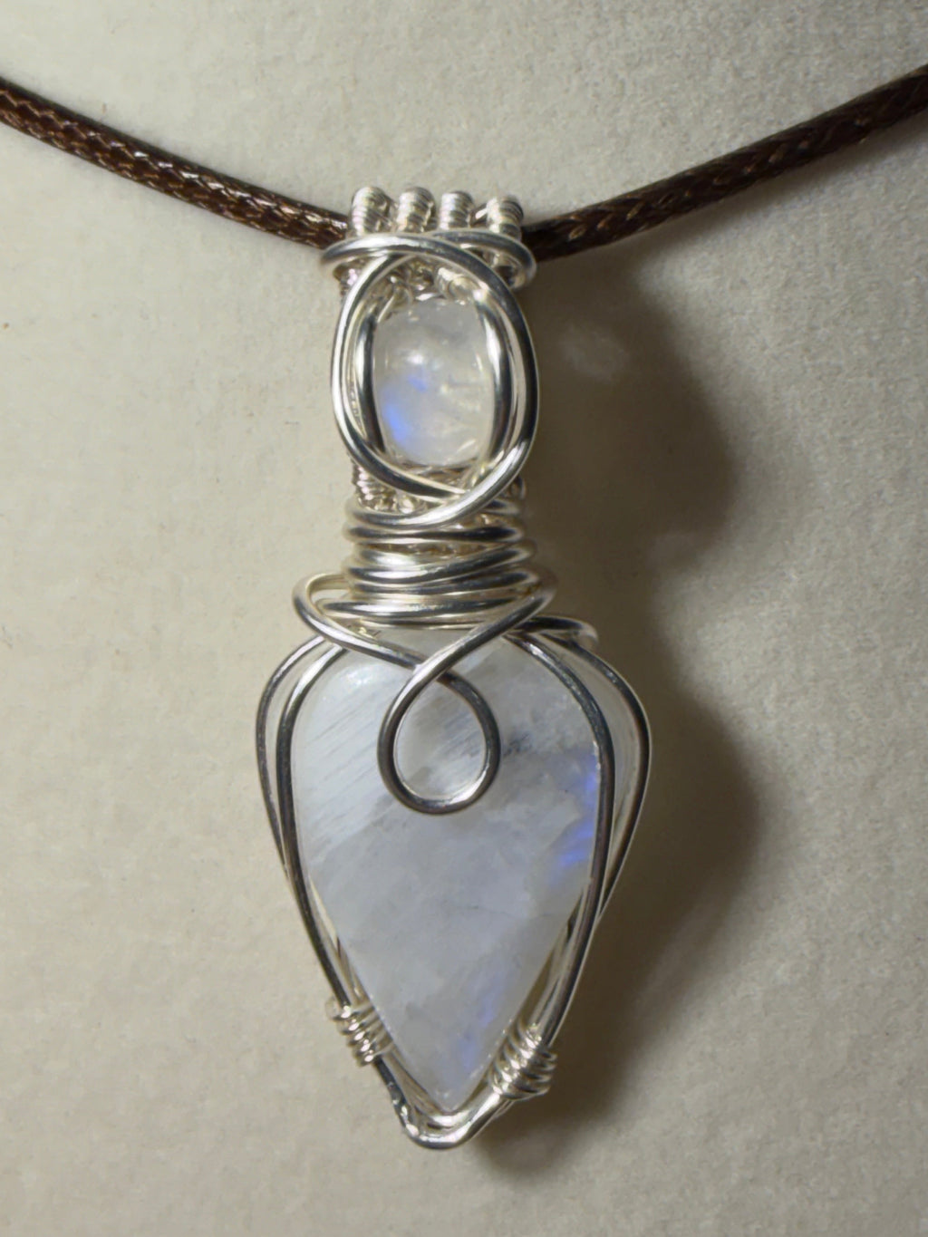 Double Moonstone silver-tone copper wire-wrapped pendant