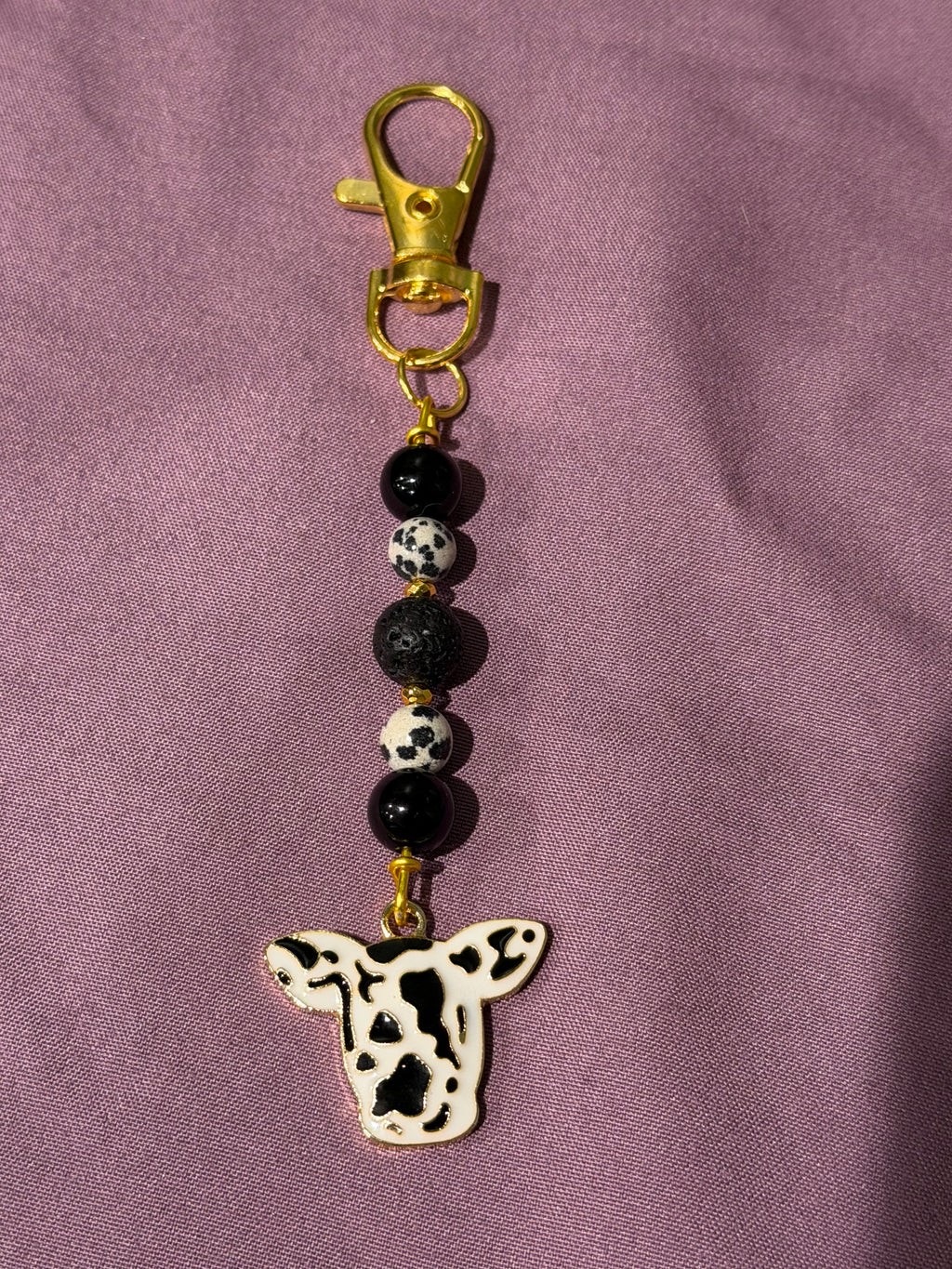 Dalmatian Jasper, Black Agate & Lava Stone gold-tone cow keychain/ purse charm