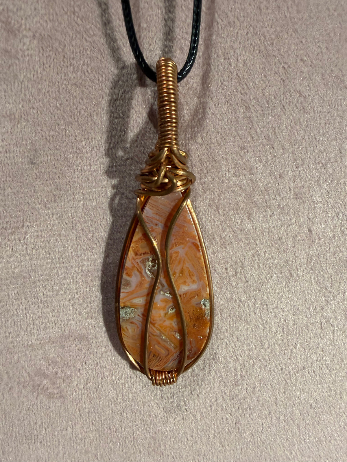 Pink Stick Agate copper wire-wrapped pendant