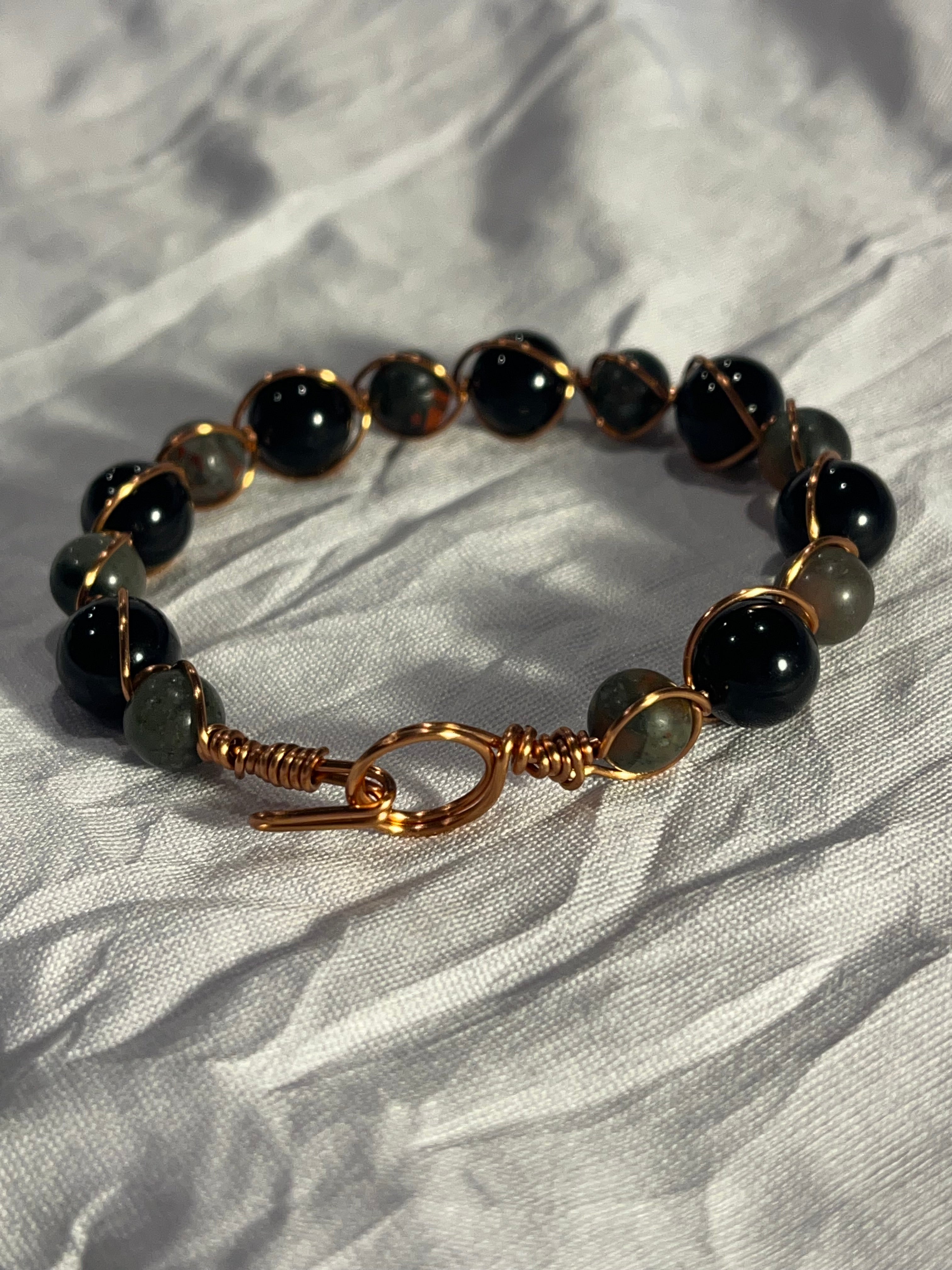 Black Onyx & African Bloodstone 6.5 inch copper wire-wrapped bracelet