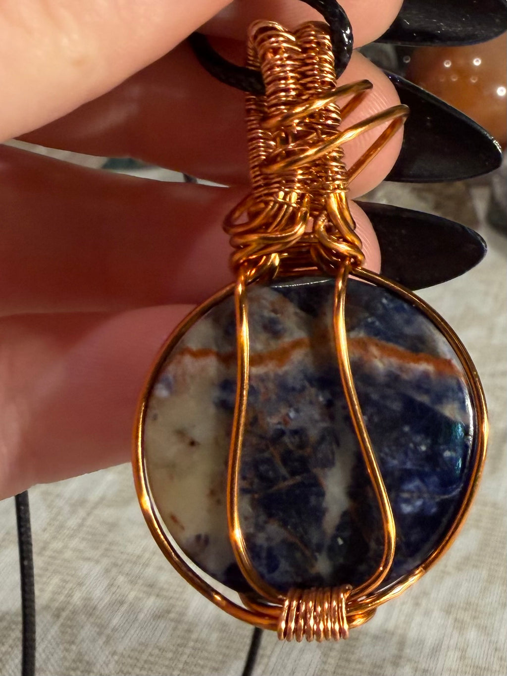 Sodalite copper wire-wrapped pendant