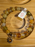 Amber 6-inch stretchy bracelet with sun charm