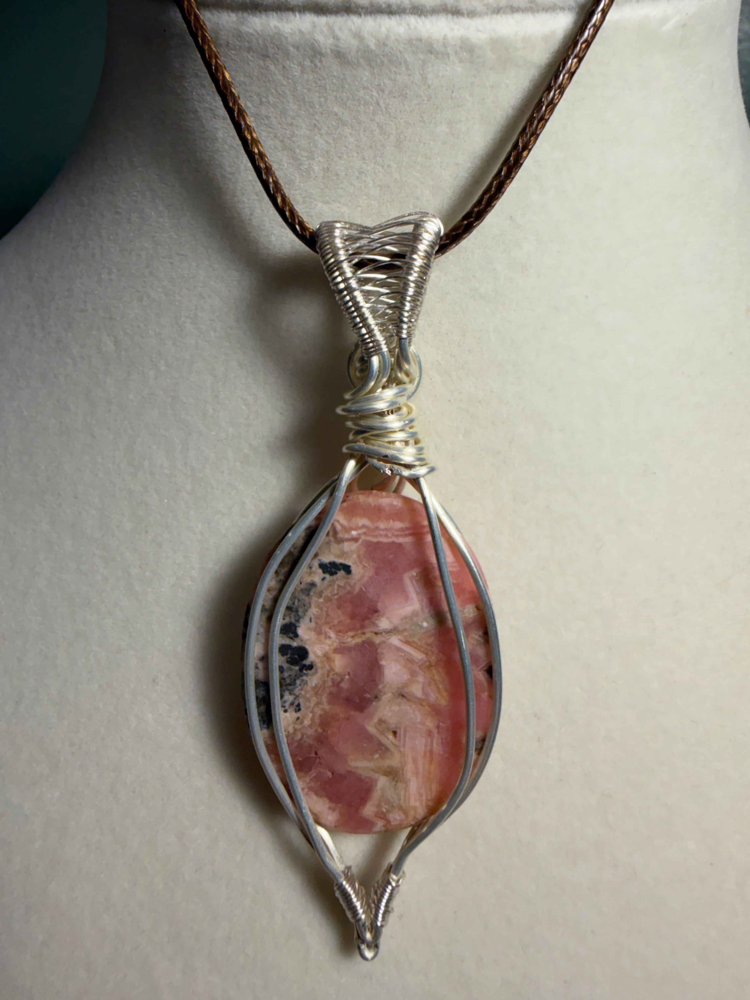 Rhodochrosite silver-tone copper wire-wrapped pendant