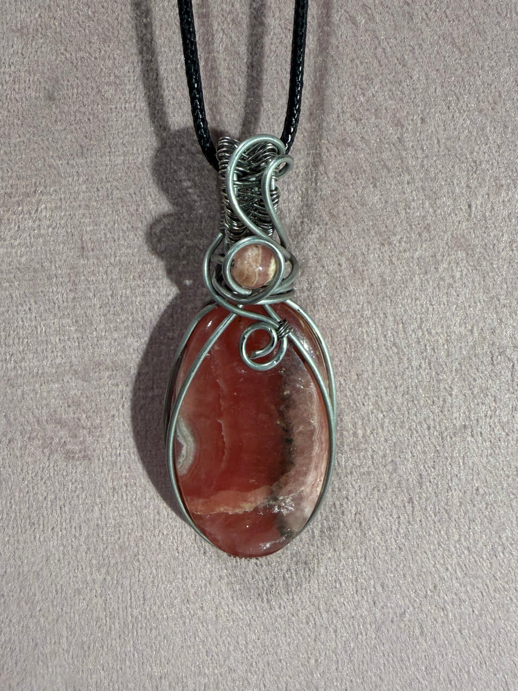 Rhodochrosite stainless steel wire-wrapped pendant