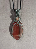 Rhodochrosite stainless steel wire-wrapped pendant