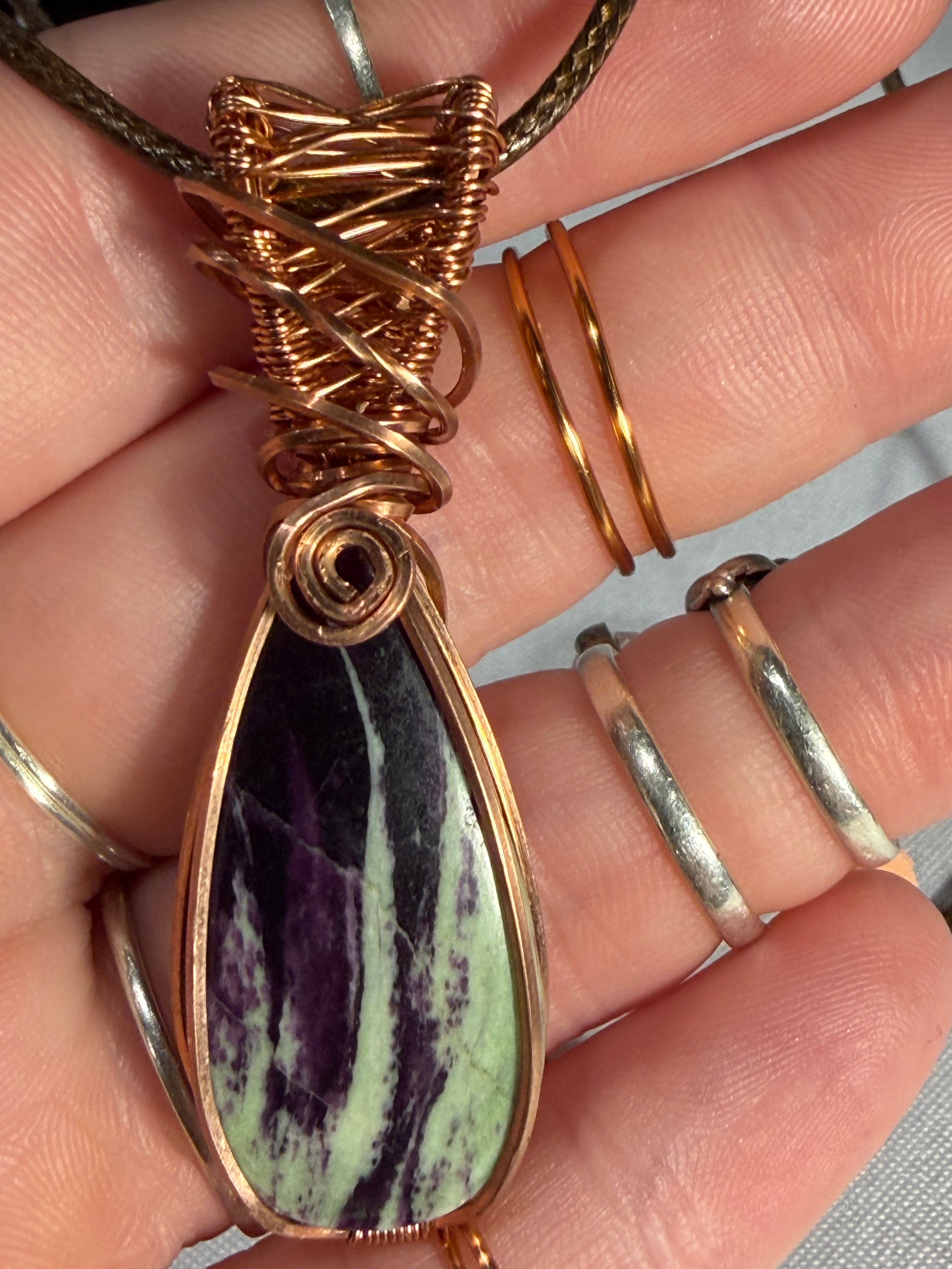 Kammererite copper wire-wrapped pendant