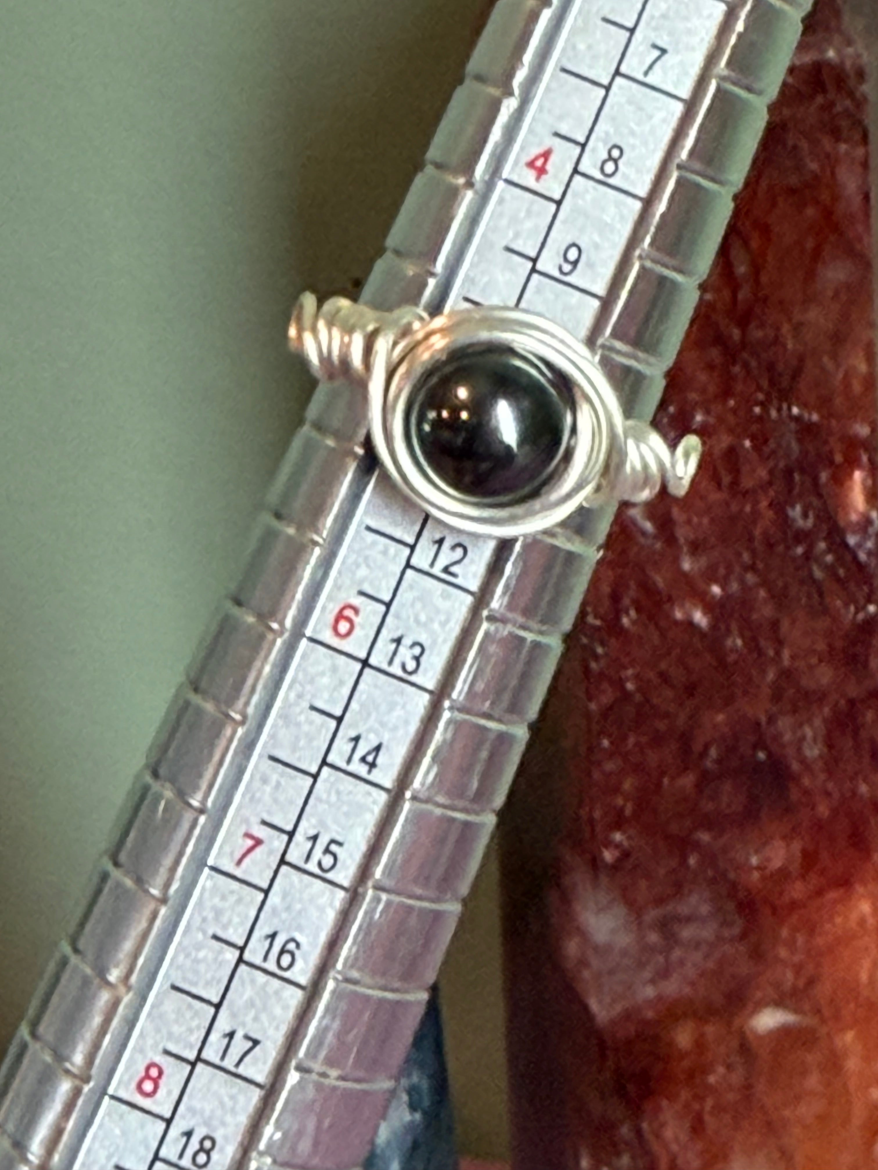 Hematite size 5 silver-tone copper wire-wrapped ring