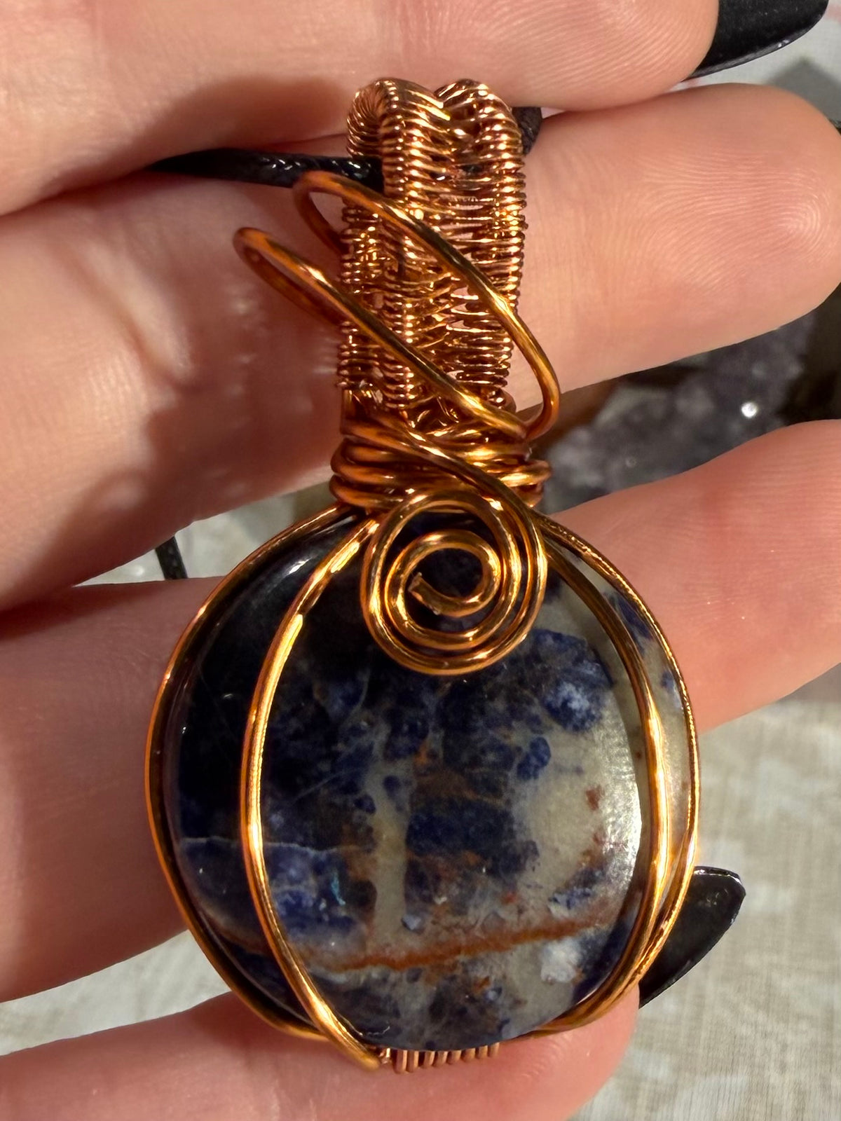 Sodalite copper wire-wrapped pendant