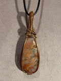 Pink Stick Agate copper wire-wrapped pendant