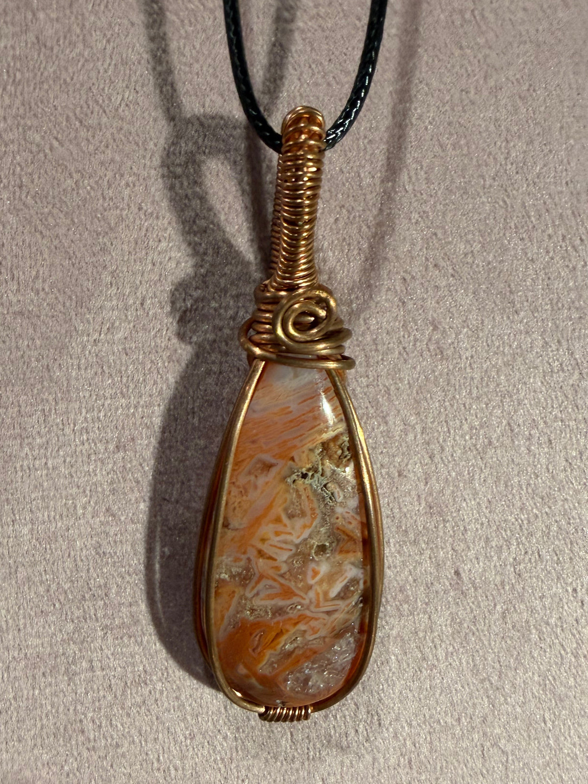 Pink Stick Agate copper wire-wrapped pendant