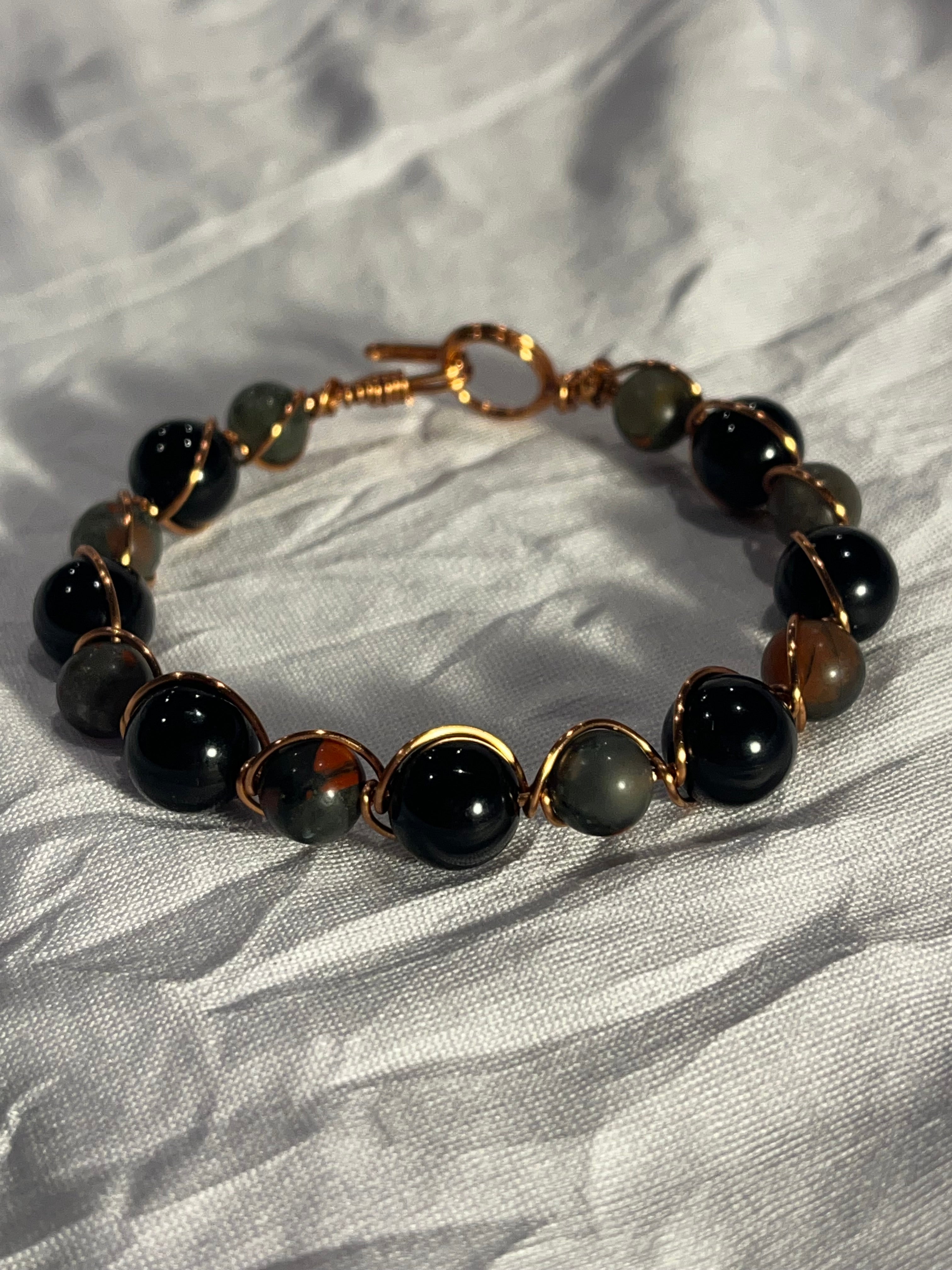Black Onyx & African Bloodstone 6.5 inch copper wire-wrapped bracelet
