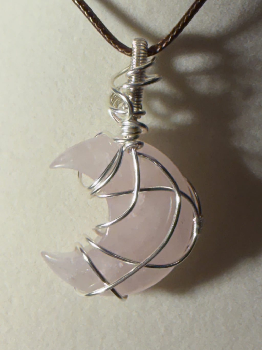 Rose Quartz silver-tone copper wire-wrapped moon pendant