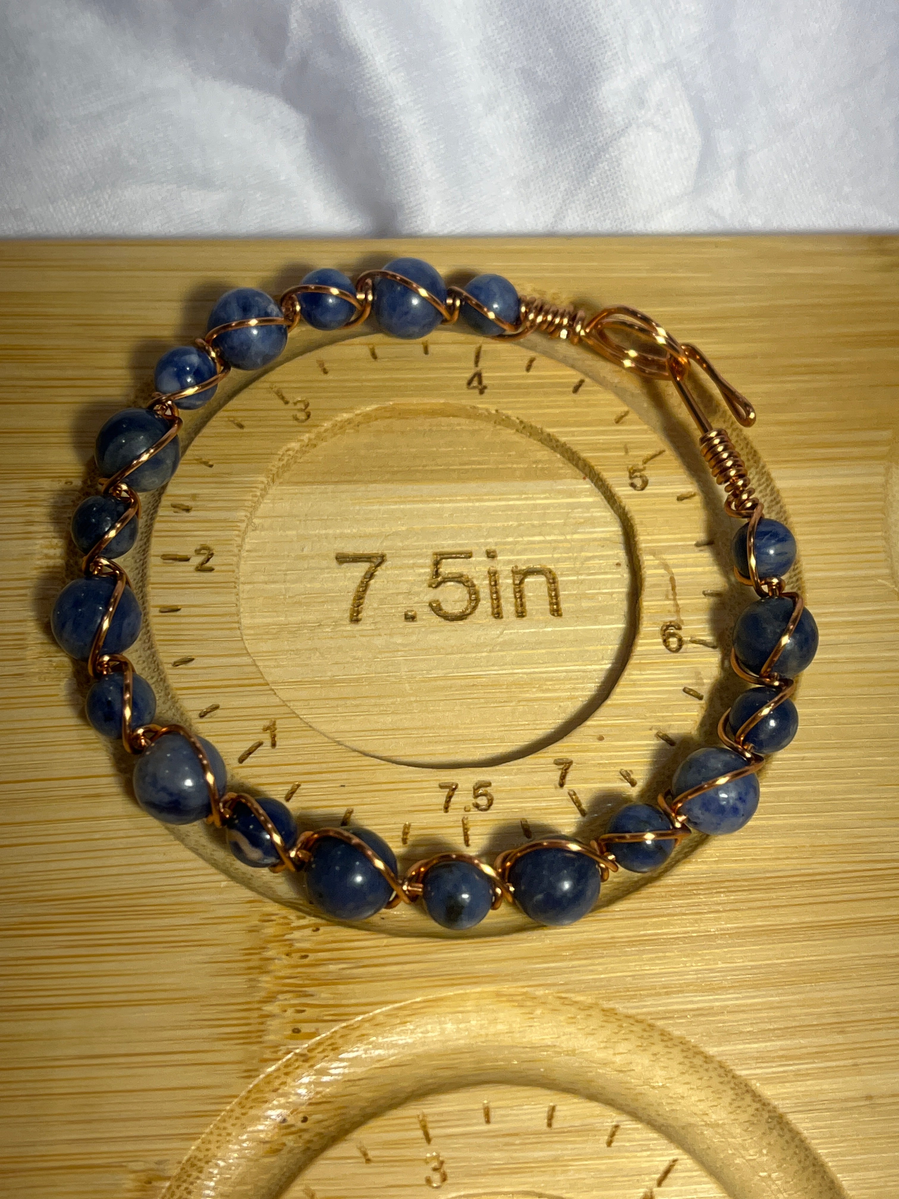 Sodalite 7.5 inch copper wire-wrapped bracelet