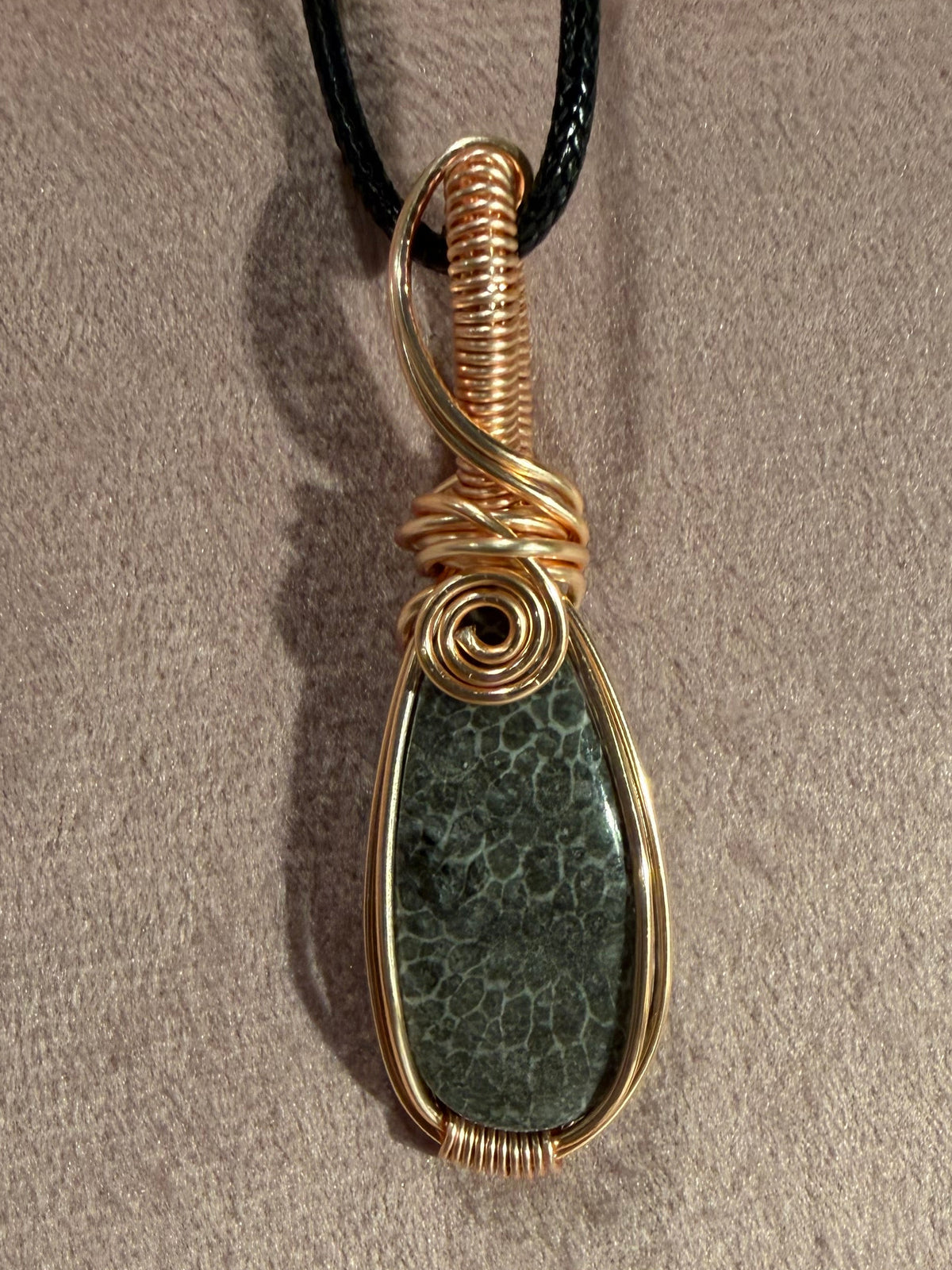 Agatized fossil coral rose gold colored copper wire-wrapped pendant