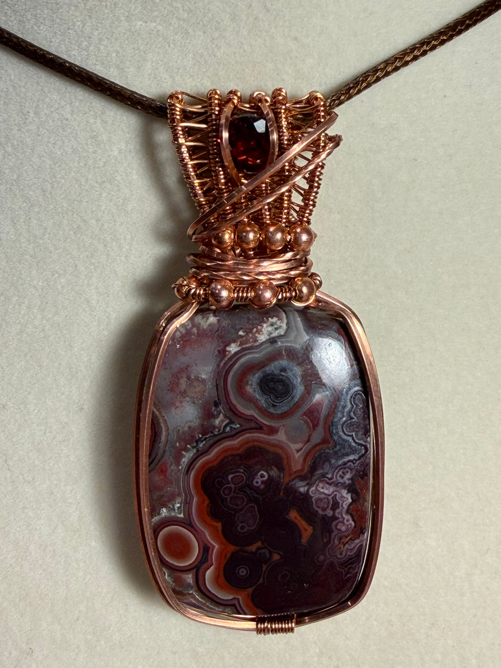 Mexican Crazy Lace Agate & Garnet copper wire-wrapped pendant